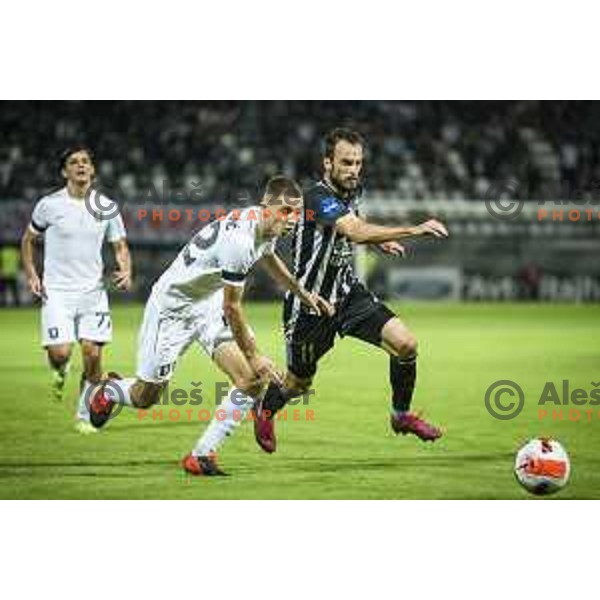 Michael Pavlociv vs Ziga Kous in action during Prva liga Telemach football match between Mura and Olimpija in Fazanerija, Murska Sobota, Slovenia on September 11, 2021