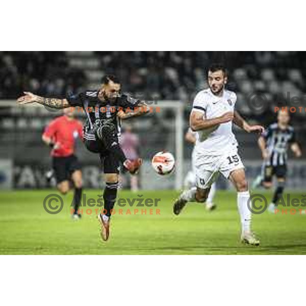 Mitja Lotric vs Dorde Crnomarkovic in action during Prva liga Telemach football match between Mura and Olimpija in Fazanerija, Murska Sobota, Slovenia on September 11, 2021