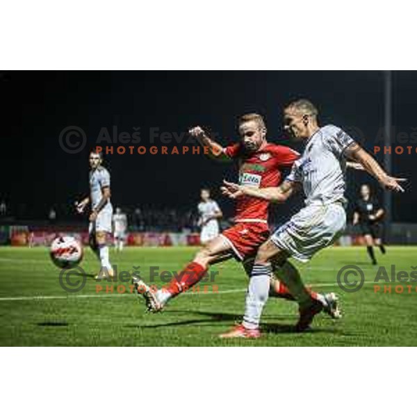 Gasper Pecnik vs Marko Alvir in action during Prva liga Telemach football match between Aluminij and Maribor in Sportni park Aluminij, Kidricevo, Slovenia on September 12, 2021