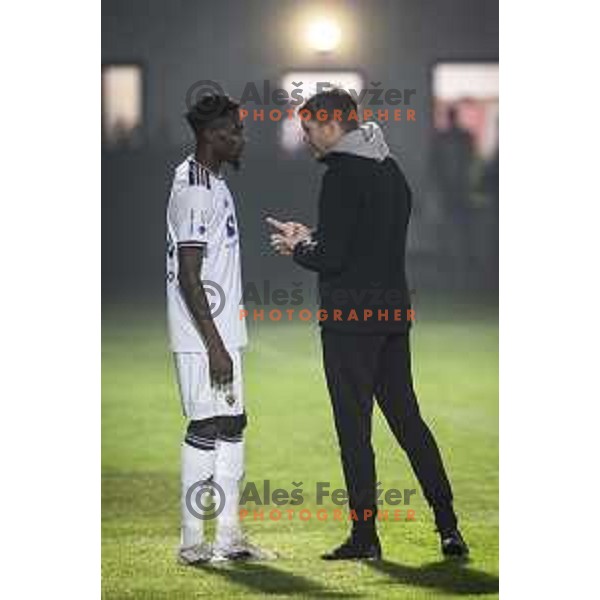 Malik Sellouki and Simon Rozman, head coach of Maribor during Prva liga Telemach football match between Aluminij and Maribor in Sportni park Aluminij, Kidricevo, Slovenia on September 12, 2021