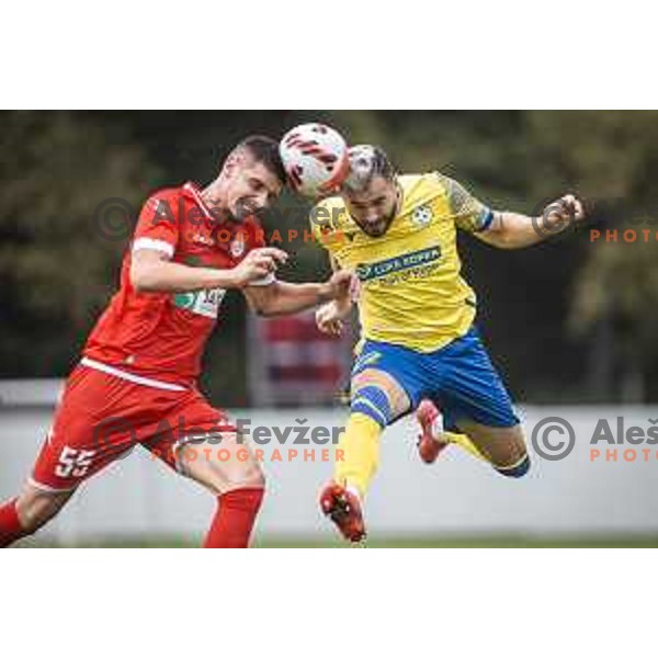 Emir Azemovic vs Maks Barisic in action during Slovenian Cup 2021/22 football match between Aluminij and Koper in Kidricevo, Slovenia on September 16, 2021