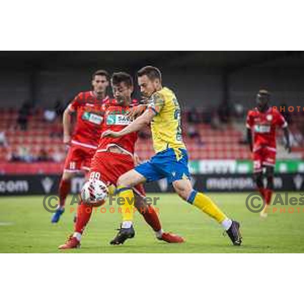 Armin Derlek vs Stjepan Ostrek in action during Slovenian Cup 2021/22 football match between Aluminij and Koper in Kidricevo, Slovenia on September 16, 2021