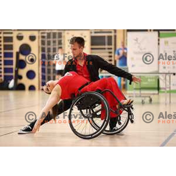 Klemen Dremelj and Lara Nedeljkovic perform during Day of Paralympic sports in Menges Sports Hall, Slovenia on September 27, 2021