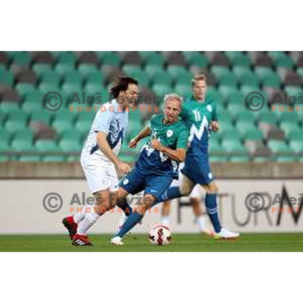 Miran Pavlin and Jani Klemencic in action during Fundacija Miroslava Cerarja and OKS Charity football match in Arena Stozice, Ljubljana, Slovenia on October 1, 2021