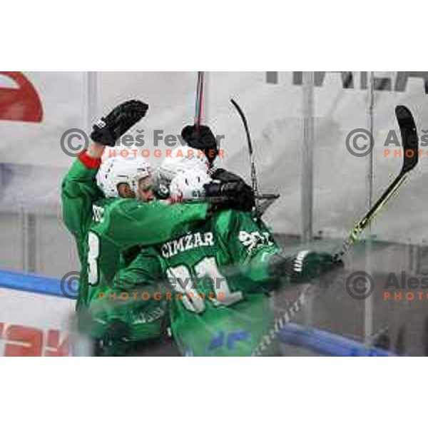 Blaz Tomazevic and Tadej Cimzar of SZ Olimpija in action during IceHL match between SZ Olimpija and Red Bulls Salzburg in Ljubljana, Slovenia on October 10, 2021