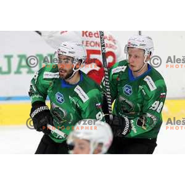 Zan Jezovsek and Blaz Tomazevic of SZ Olimpija in action during IceHL match between SZ Olimpija and Red Bulls Salzburg in Ljubljana, Slovenia on October 10, 2021