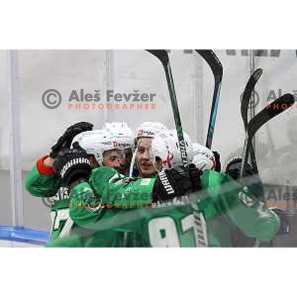 Zan Jezovsek and Blaz Tomazevic of SZ Olimpija in action during IceHL match between SZ Olimpija and Red Bulls Salzburg in Ljubljana, Slovenia on October 10, 2021