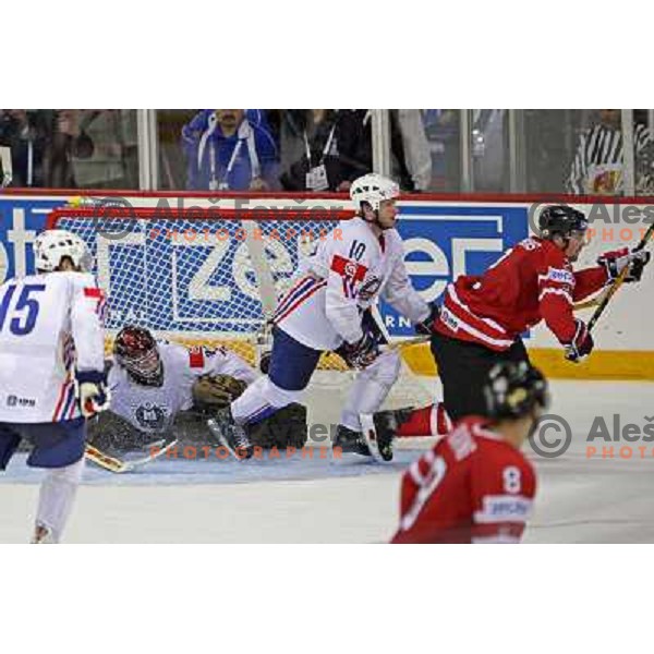 Muric (15), Kristan and Varl (10) of Slovenia and Hamhuis of Canada at IIHF World championship 2008 preliminary round group B, played in Halifax, Nova Scotia, Canada May 2nd 2008. Canada beat Slovenia 5:1. Photo by Ales Fevzer 