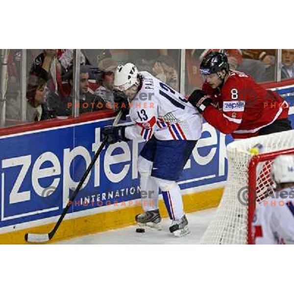 Pajic (13) of Slovenia and Burns (8) of Canada at IIHF World championship 2008 preliminary round group B, played in Halifax, Nova Scotia, Canada May 2nd 2008. Canada beat Slovenia 5:1. Photo by Ales Fevzer 