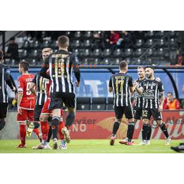 Klemen Sturm, Mitja Lotric and other players of Mura celebrating during Prva liga Telemach football match between Mura and Aluminij in Fazanerija, Murska Sobota, Slovenia on October 16, 2021