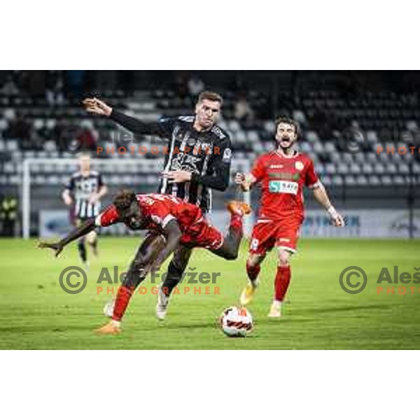 Nardin Mulahusejnovic vs Chinwendu Johan Nkama in action during Prva liga Telemach football match between Mura and Aluminij in Fazanerija, Murska Sobota, Slovenia on October 16, 2021