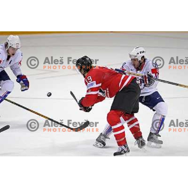 Kopitar and Varl (10) of Slovenia and Doan (19) of Canada at IIHF World championship 2008 preliminary round group B, played in Halifax, Nova Scotia, Canada May 2nd 2008. Canada beat Slovenia 5:1. Photo by Ales Fevzer 