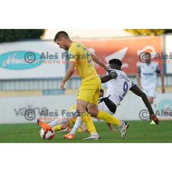 Lamin Colley of Koper and Dejan Vuklisevic of Domzale in action during Prva Liga Telemach football match between Domzale and Koper in Domzale, Slovenia on October 17, 2021