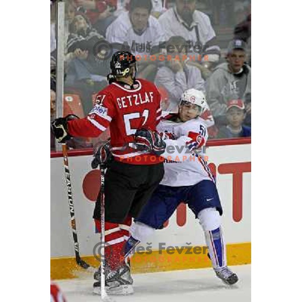 Milovanovic (51) of Slovenia and Getzlaf (51) of Canada at IIHF World championship 2008 preliminary round group B, played in Halifax, Nova Scotia, Canada May 2nd 2008. Canada beat Slovenia 5:1. Photo by Ales Fevzer 