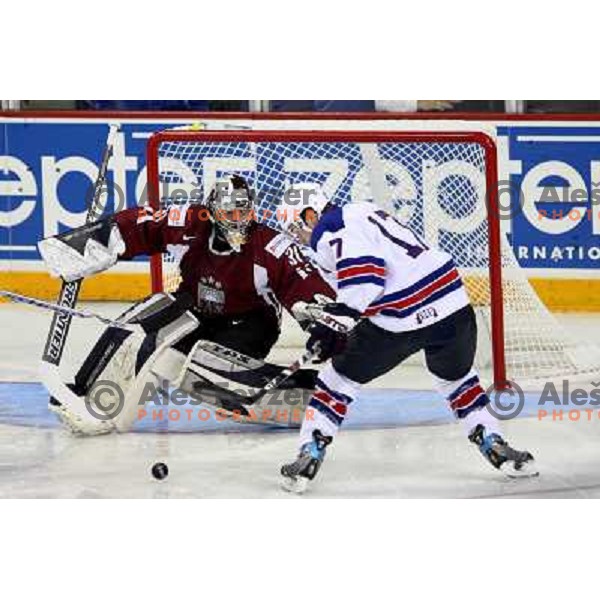 Parise (17) of USA and Masalskis (31) of Latvia at IIHF World championship 2008 preliminary round group B, played in Halifax, Nova Scotia, Canada May 2nd 2008. USA beat Latvia 4:0. Photo by Ales Fevzer 