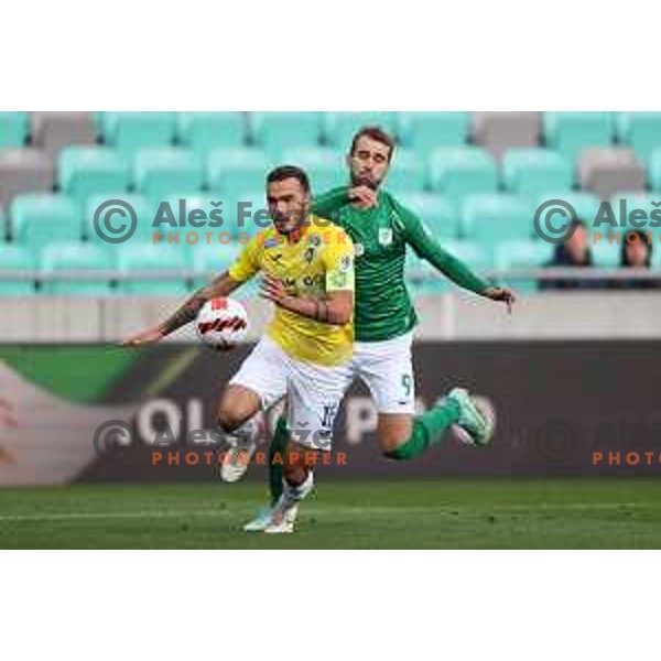 Vanja Drkusic and Mustafa Nukic in action during Prva Liga Telemach football match between Olimpija and Bravo in Ljubljana, Slovenia on October 30, 2021