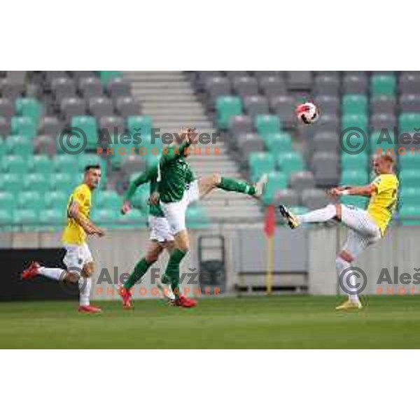 Tomislav Tomic of Olimpija and Sandi Ogrinec in action during Prva Liga Telemach football match between Olimpija and Bravo in Ljubljana, Slovenia on October 30, 2021