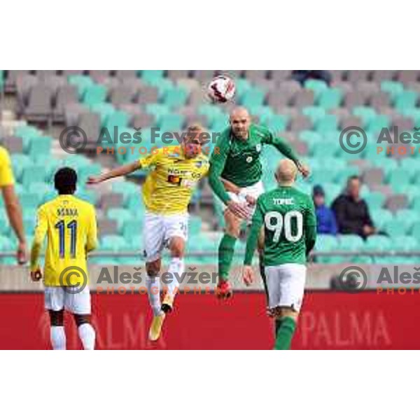 Sandi Ogrinec and Goran Milovic in action during Prva Liga Telemach football match between Olimpija and Bravo in Ljubljana, Slovenia on October 30, 2021