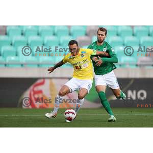 Vanja Drkusic and Mustafa Nukic in action during Prva Liga Telemach football match between Olimpija and Bravo in Ljubljana, Slovenia on October 30, 2021