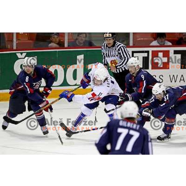 Kessel (8), O\'Sullivan (9) and Burish (37) of USA try to stop Anze Kopitar (11) of Slovenia at IIHF World championship 2008 preliminary round group B, played in Halifax, Nova Scotia, Canada May 4th 2008. USA beat Slovenia 5:1. Photo by Ales Fevzer 