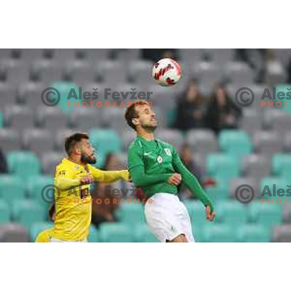 Nemanja Jaksic and Mustafa Nukic in action during Prva Liga Telemach football match between Olimpija and Bravo in Ljubljana, Slovenia on October 30, 2021