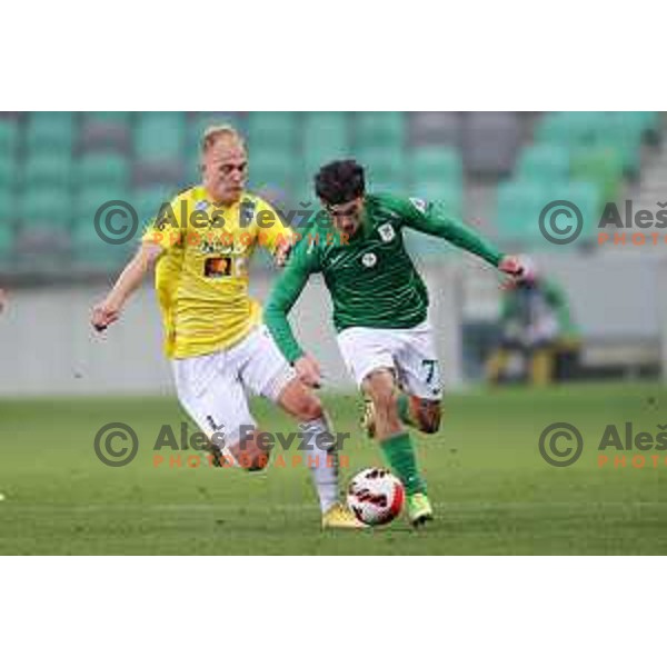 Sandi Ogrinec and Almedin Ziljkic in action during Prva Liga Telemach football match between Olimpija and Bravo in Ljubljana, Slovenia on October 30, 2021