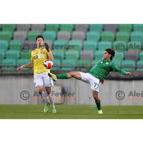 Martin Kramaric and Almedin Ziljkic in action during Prva Liga Telemach football match between Olimpija and Bravo in Ljubljana, Slovenia on October 30, 2021