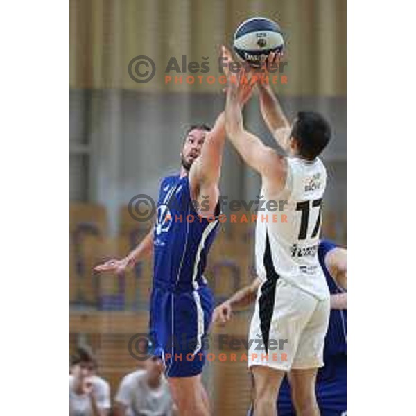 Casey Bryan Benson and Niko Bacvic in action during Nova KBM league basketball match between Nutrispoint Ilirija and Terme Olimia Podcetrtek in Tivoli Hall, Ljubljana, Slovenia on October 30, 2021