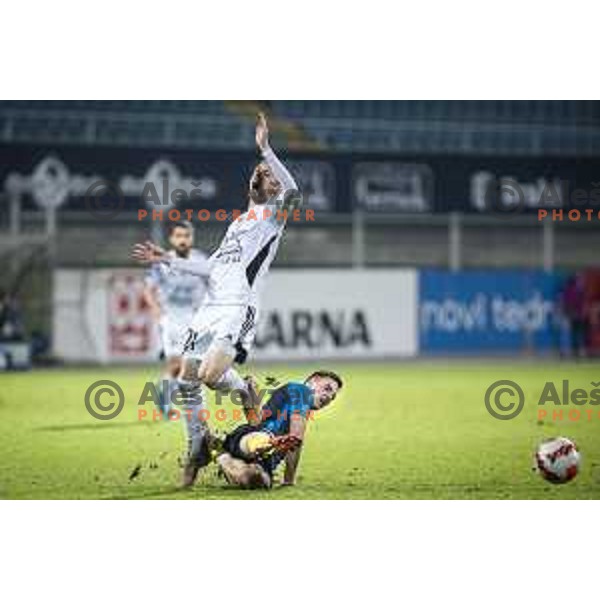 Zan Karnicnik vs Tamar Svetlin in action during Prva liga Telemach football match between Celje and Mura in Arena z’dezele, Celje, Slovenia on October 31, 2021. Photo: Jure Banfi/www.alesfevzer.com