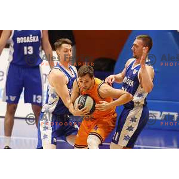 Petar Vujacic, Tadej Ferme and Domen Bratoz in action during Nova KBM league basketball match between Helios Suns and Rogaska in Domzale, Slovenia on November 1, 2021