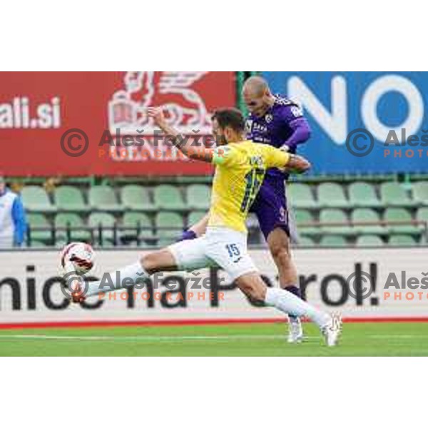 Ognjen Mudrinski scores goal past Vanja Drkusic during Prva Liga Telemach football match between Bravo and Maribor in Ljubljana, Slovenia on November 6, 2021
