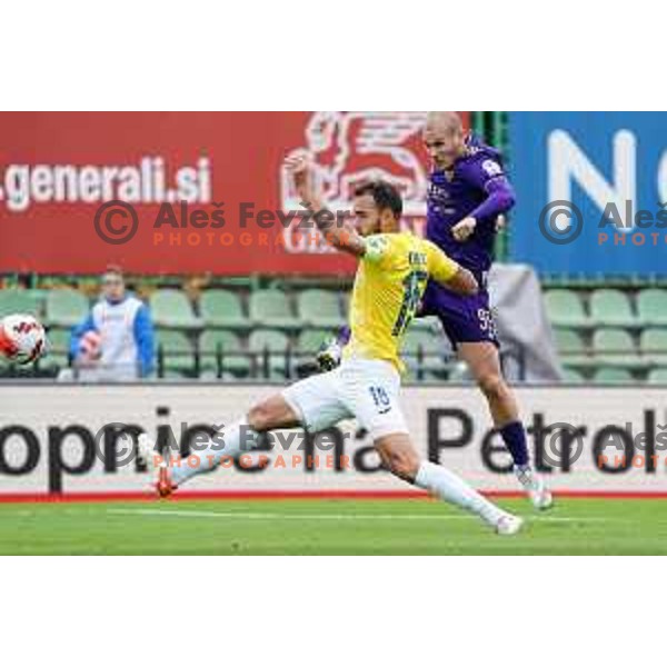 Ognjen Mudrinski scores goal past Vanja Drkusic during Prva Liga Telemach football match between Bravo and Maribor in Ljubljana, Slovenia on November 6, 2021