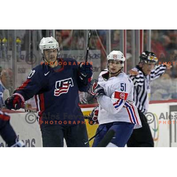 Brown of USA and Milovanovic (51) of Slovenia at IIHF World championship 2008 preliminary round group B, played in Halifax, Nova Scotia, Canada May 4th 2008. USA beat Slovenia 5:1. Photo by Ales Fevzer 