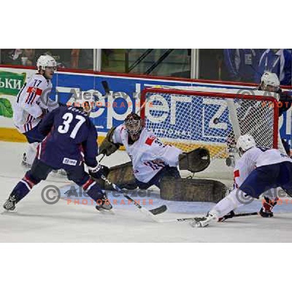Burish (37) of USA and Vidmar (77),Kristan (33) of Slovenia at IIHF World championship 2008 preliminary round group B, played in Halifax, Nova Scotia, Canada May 4th 2008. USA beat Slovenia 5:1. Photo by Ales Fevzer 