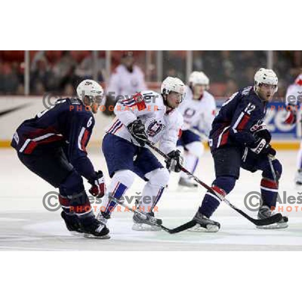 Gleason (6) and Stempniak (12) of USA and Music (16) of Slovenia at IIHF World championship 2008 preliminary round group B, played in Halifax, Nova Scotia, Canada May 4th 2008. USA beat Slovenia 5:1. Photo by Ales Fevzer 