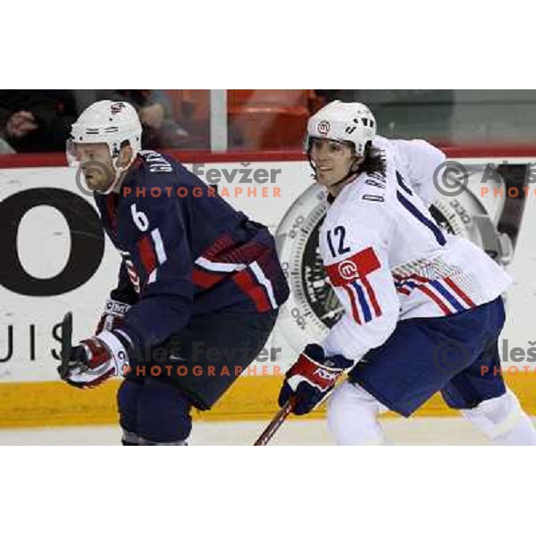 Gleason (6) of USA and David Rodman (12) of Slovenia at IIHF World championship 2008 preliminary round group B, played in Halifax, Nova Scotia, Canada May 4th 2008. USA beat Slovenia 5:1. Photo by Ales Fevzer 