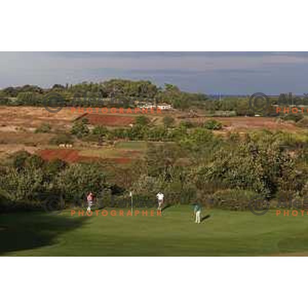 Dean Duzaic, Ivan Ninkovic and Filip Brencic on the green of second hole of Adriatic golf course ( 6359 meters, par 72), Savudrija, Croatia on September 21, 2021