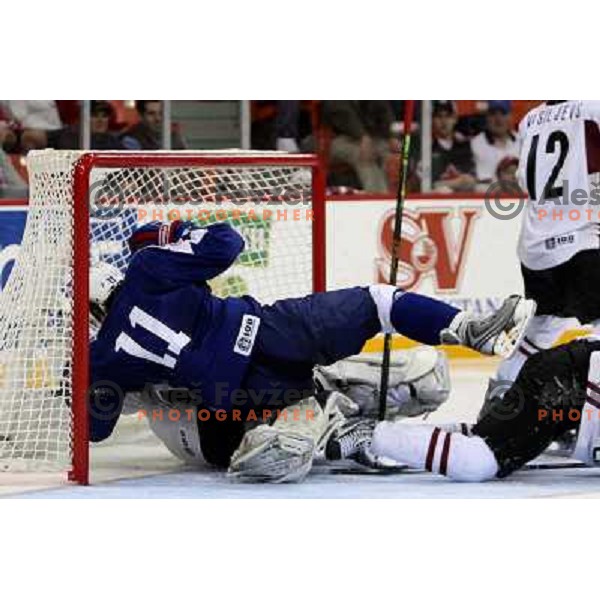 Kopitar of Slovenia and Masalskis of Latvia at IIHF World Championship 2008, preliminary round, group B, played in Halifax, Nova Scotia, Canada on 6th of May 2008. Latvia won the game 3:0. Photo by Ales Fevzer 