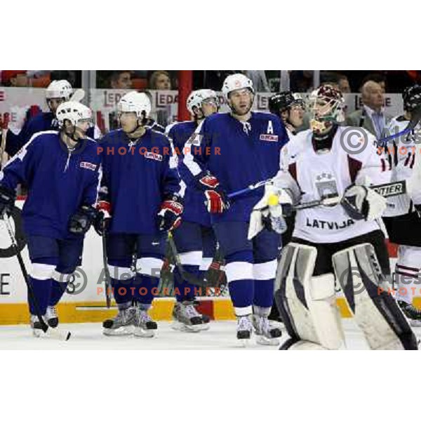 Robar and Razingar of Slovenia and Masalskis of Latvia at IIHF World Championship 2008, preliminary round, group B, played in Halifax, Nova Scotia, Canada on 6th of May 2008. Latvia won the game 3:0. Photo by Ales Fevzer 