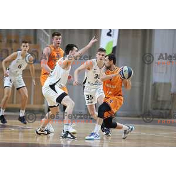 in action during Nova KBM league basketball match between Nutrispoint Ilirija and Helios Suns in Ljubljana, Slovenia on November 21, 2021