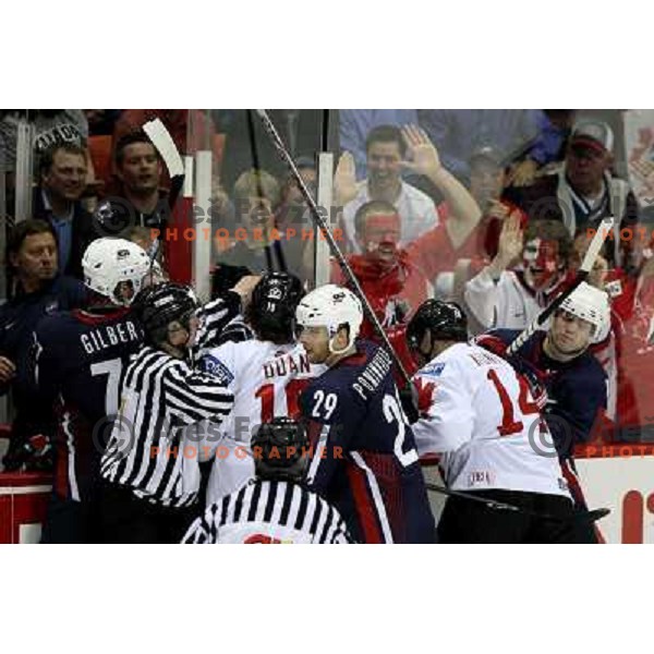 Doan of Canada and Gilbert of USA at 2008 IIHF World Championship, played in Metro Arena, Halifax, Nova Scotia,Canada, May 6th 2008.Canada won the game 5:4. Photo by Ales Fevzer 