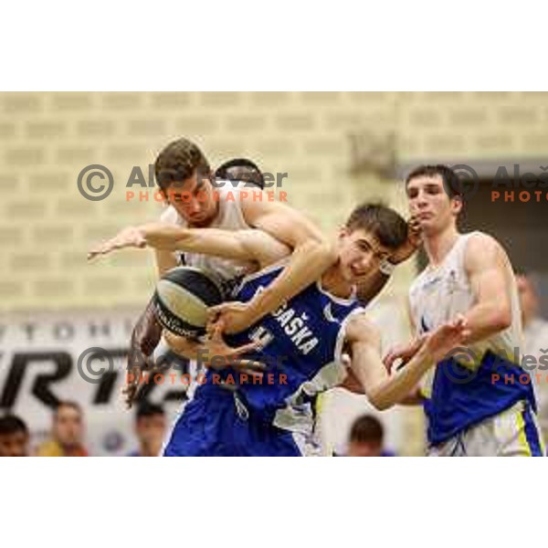 in action during Nova KBM league basketball match between ECE Triglav and Rogaska in Kranj, Slovenia on December 7, 2021