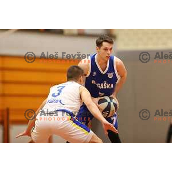 in action during Nova KBM league basketball match between ECE Triglav and Rogaska in Kranj, Slovenia on December 7, 2021