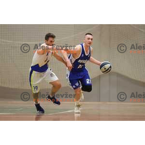 in action during Nova KBM league basketball match between ECE Triglav and Rogaska in Kranj, Slovenia on December 7, 2021