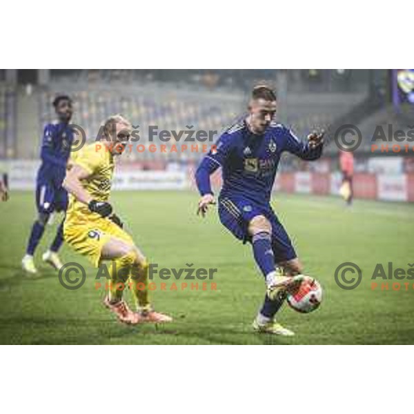 Zeni Husmani vs Marko Alvir in action during Prva liga Telemach football match between Maribor and Domzale in Ljudski vrt, Maribor, Slovenia on December 11, 2021. Photo: Jure Banfi/www.alesfevzer.com