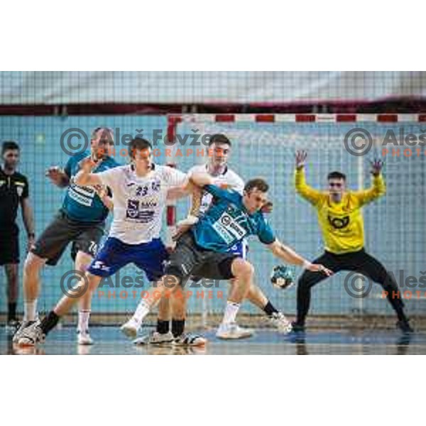 Anze Blagotinsek vs Marin Buneta in action during Slovenian Cup handball match between Maribor Branik and Riko Ribnica in Luknja, Maribor, Slovenia on December 15, 2021. Photo: Jure Banfi/www.alesfevzer.com