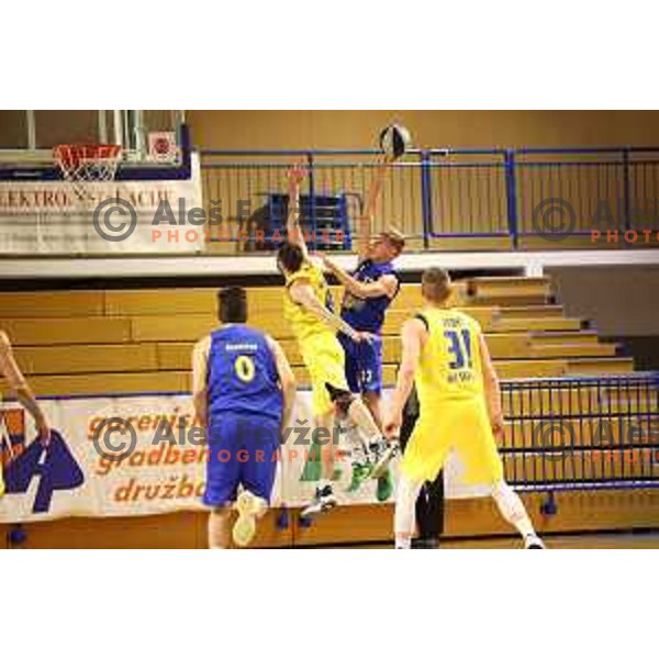 in action during Nova KBM league basketball match between Sencur GGD- and Hopsi Polzela in Sencur, Slovenia on December 28, 2021