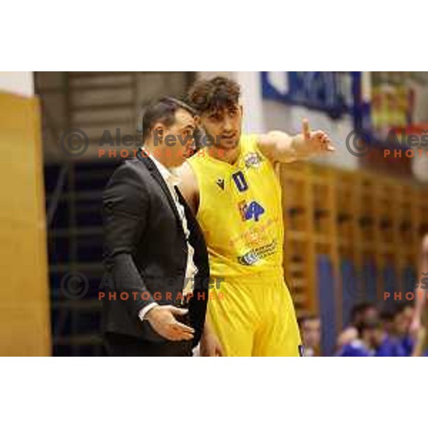 Head coach Miljan Pavkovic and Vojin Ivkovic in action during Nova KBM league basketball match between Sencur GGD- and Hopsi Polzela in Sencur, Slovenia on December 28, 2021