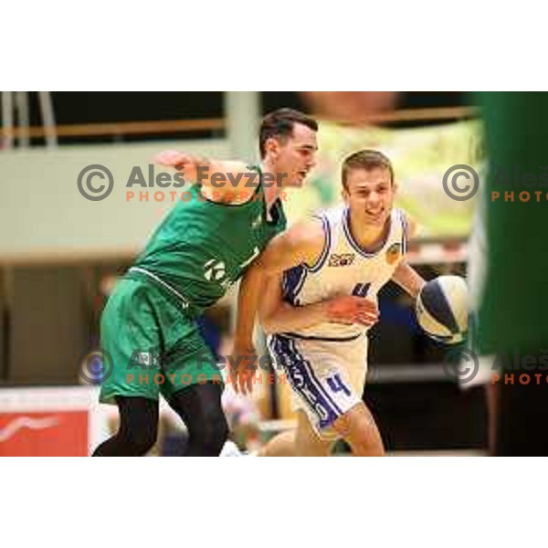 Jure Span and Elvis Keric in action during Nova KBM league basketball match between Zlatorog Lasko and Krka in Lasko, Slovenia on December 29, 2021 