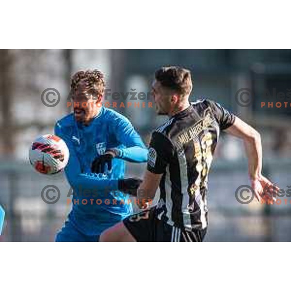Ziga Zivko vs Nardin Mulahusejnovic in action during friendly football match between NS Mura and Nafta 1903 in Fazanerija, Murska Sobota, Slovenia on January 15, 2022. Photo: Jure Banfi/www.alesfevzer.com